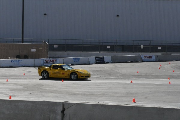 Bob Bondurant instructors take SEMA participants around SEMA MotorTrend Pro