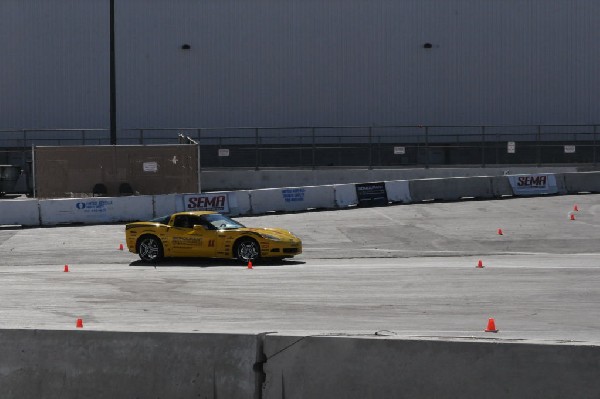 Bob Bondurant instructors take SEMA participants around SEMA MotorTrend Pro