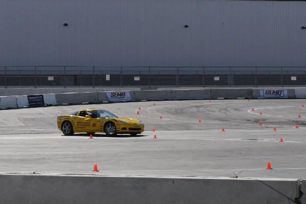 Bob Bondurant instructors take SEMA participants around SEMA MotorTrend Pro