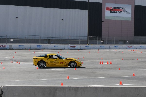 Bob Bondurant instructors take SEMA participants around SEMA MotorTrend Pro