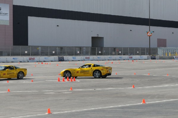 Bob Bondurant instructors take SEMA participants around SEMA MotorTrend Pro