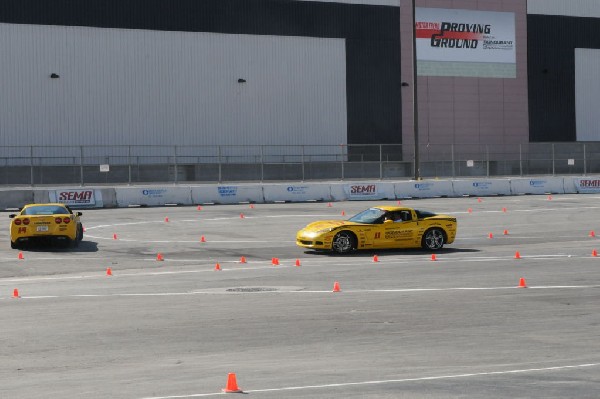 Bob Bondurant instructors take SEMA participants around SEMA MotorTrend Pro