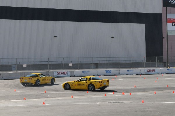 Bob Bondurant instructors take SEMA participants around SEMA MotorTrend Pro