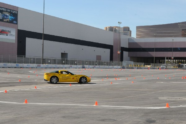 Bob Bondurant instructors take SEMA participants around SEMA MotorTrend Pro