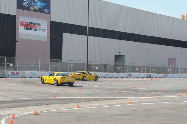 Bob Bondurant instructors take SEMA participants around SEMA MotorTrend Pro