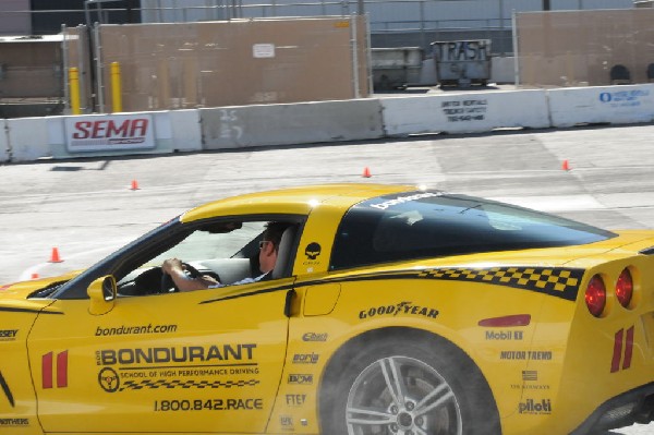 Bob Bondurant instructors take SEMA participants around SEMA MotorTrend Pro