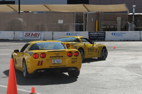 Bob Bondurant instructors take SEMA participants around SEMA MotorTrend Pro