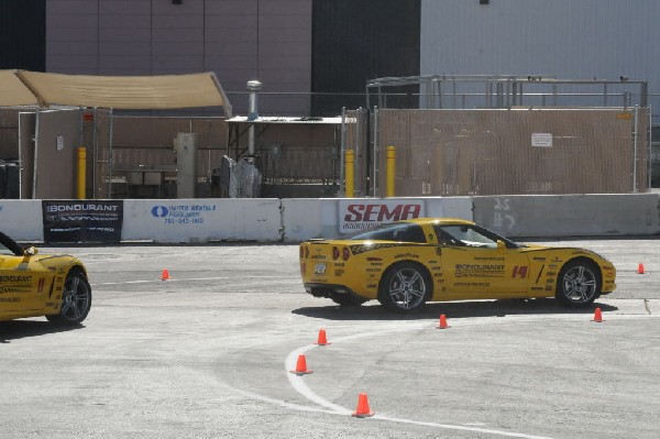 Bob Bondurant instructors take SEMA participants around SEMA MotorTrend Pro