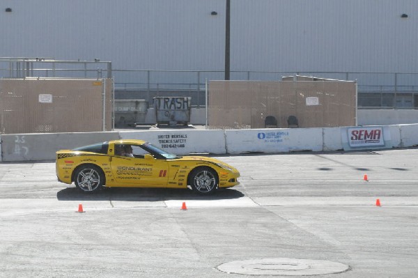 Bob Bondurant instructors take SEMA participants around SEMA MotorTrend Pro