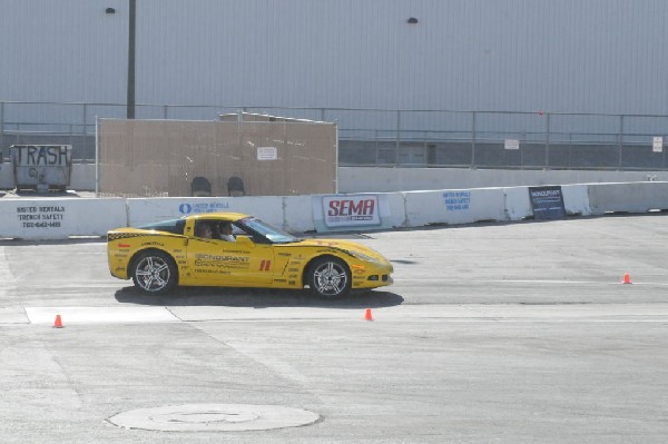 Bob Bondurant instructors take SEMA participants around SEMA MotorTrend Pro