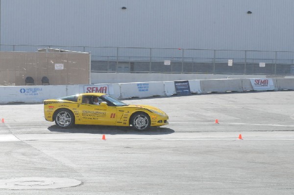 Bob Bondurant instructors take SEMA participants around SEMA MotorTrend Pro