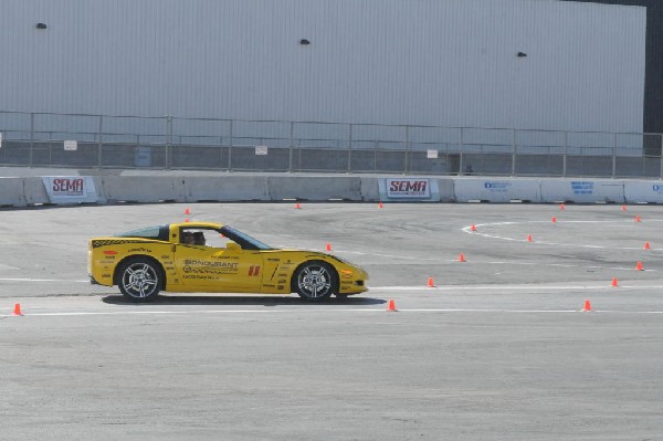 Bob Bondurant instructors take SEMA participants around SEMA MotorTrend Pro